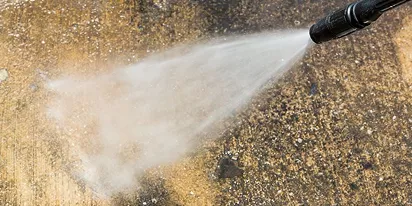 Residential concrete driveway cleaning ebong maintenance guidance image.