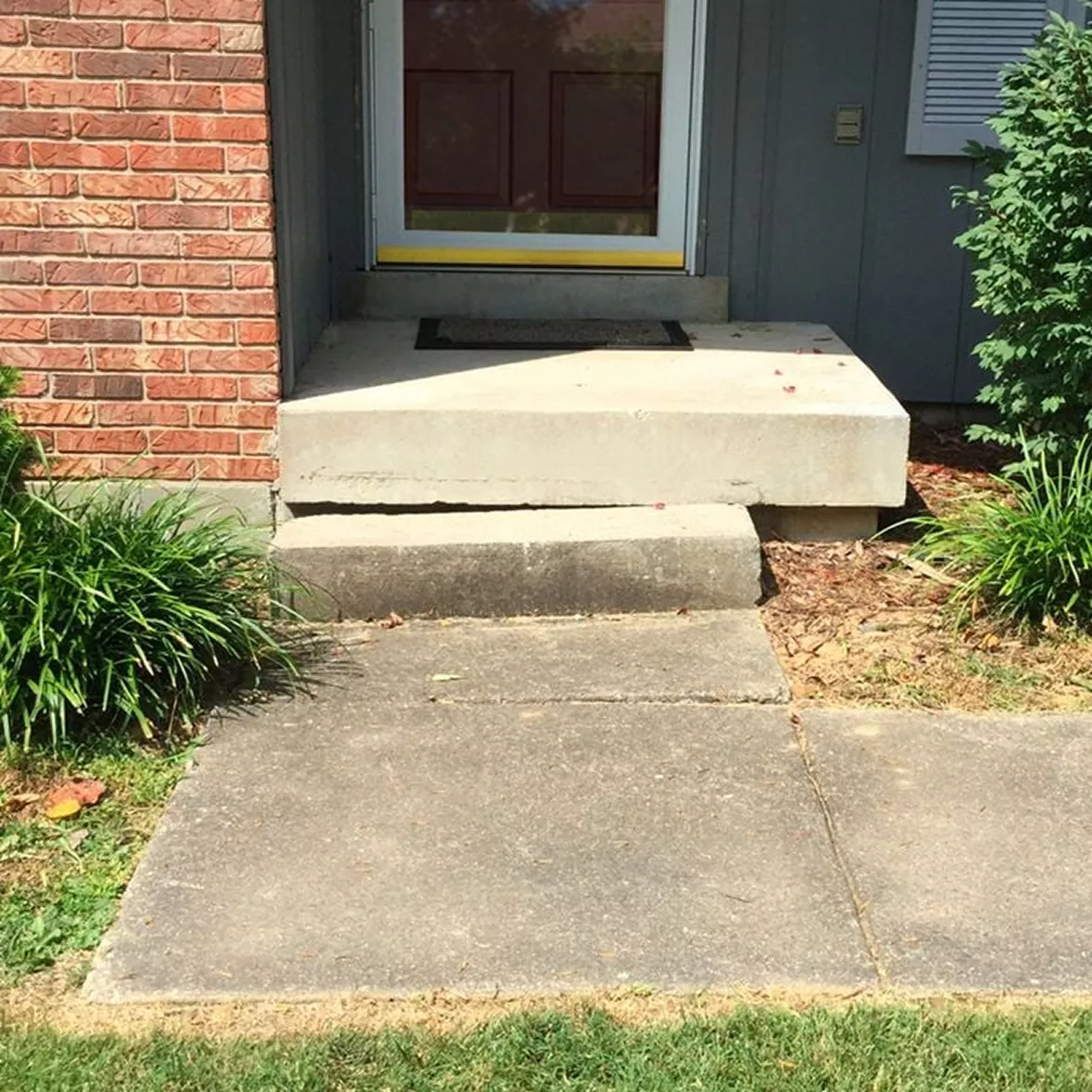 Sunken Front Porch Stoop – Before Concrete Lifting Dropped concrete landing step sunken 3 inches below the front entryway door threshold.